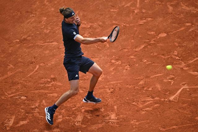 Germany's Alexander Zverev plays a forehand return to Czech Republic's Jakub Mensik during their men's semi final singles match on day 13 of the French Open tennis tournament on Court Philippe-Chatrier at the Roland-Garros Complex in Paris on June 5, 2026. (Photo by JULIEN DE ROSA / AFP)