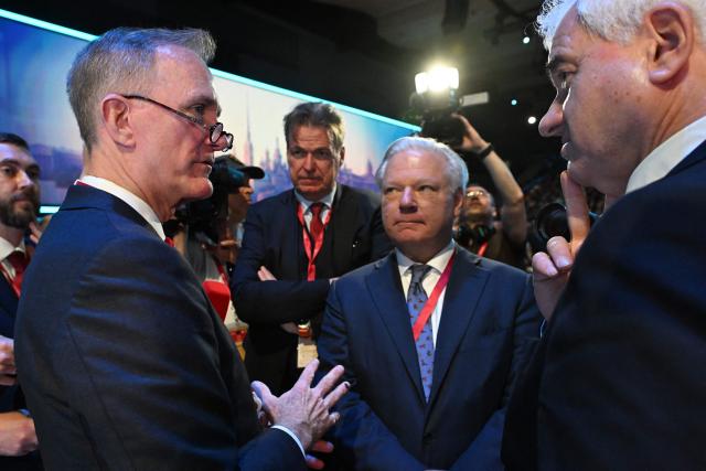 Rodney Mims Cook Jr (L), chairman of the US Commission of Fine Arts, attends the plenary session of the St. Petersburg International Economic Forum (SPIEF) in Saint Petersburg on June 5, 2026. (Photo by Olga MALTSEVA / AFP)