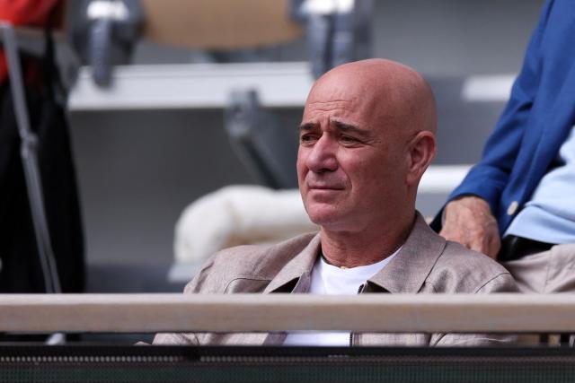 Former US tennis player Andre Agassi watches Germany's Alexander Zverev playing against Czech Republic's Jakub Mensik during their men's semi final singles match on day 13 of the French Open tennis tournament on Court Philippe-Chatrier at the Roland-Garros Complex in Paris on June 5, 2026. (Photo by Alain JOCARD / AFP)