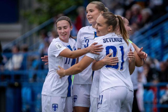 Finland's forward #21 Oona Sevenius (R) celebrates scoring the 0-3 goal with her teammates during the Women's FIFA World Cup Group B3, qualifying football match between Slovakia and Finland at the FC Nitra Stadium in Nitra, Slovakia, on June 5, 2026. (Photo by TOMAS BENEDIKOVIC / AFP)