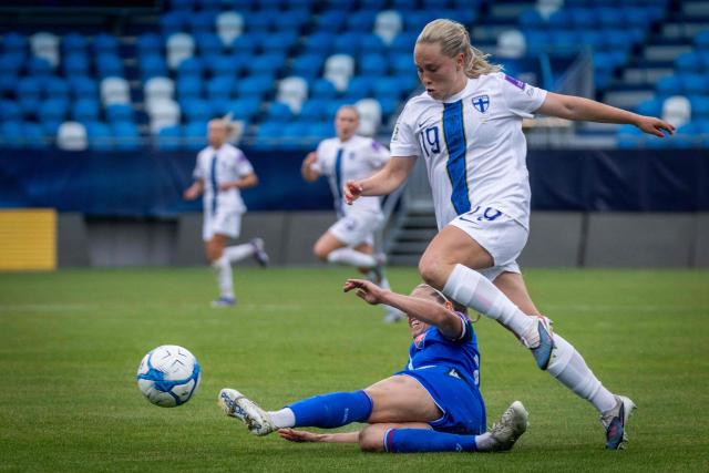 Finland's forward #19 Lotta Lindstrom (R) vies for the ball during the Women's FIFA World Cup Group B3, qualifying football match between Slovakia and Finland at the FC Nitra Stadium in Nitra, Slovakia, on June 5, 2026. (Photo by TOMAS BENEDIKOVIC / AFP)