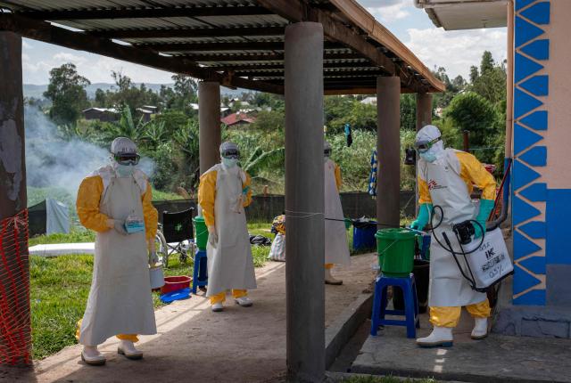 Doctors Without Border (MSF) personnel at the Elikya clinic Ebola treatment center prepare to enter the hospital rooms for Ebola patients in Bunia, in the eastern Democratic Republic of the Congo, on June 5, 2026. (Photo by GLODY MURHABAZI / AFP)