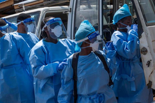 Teams responsible for dignified and safe burials are preparing to retrieve the body of a person suspected of having died from Ebola in Bunia, in the eastern Democratic Republic of the Congo, on June 5, 2026. (Photo by GLODY MURHABAZI / AFP)