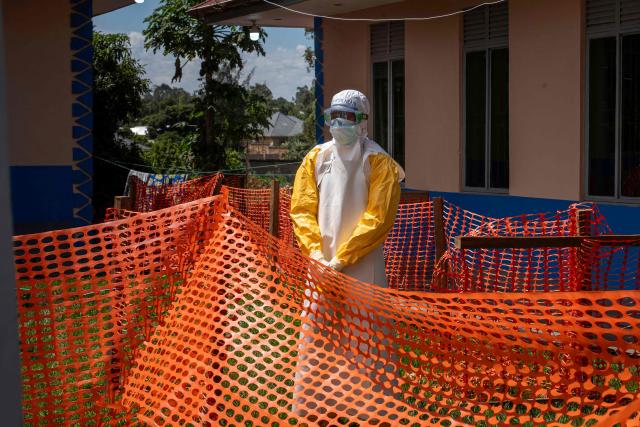 Doctors Without Border (MSF) personnel at the Elikya clinic Ebola treatment center leaves the hospital rooms for Ebola patients in Bunia, in the eastern Democratic Republic of the Congo, on June 5, 2026. (Photo by GLODY MURHABAZI / AFP)