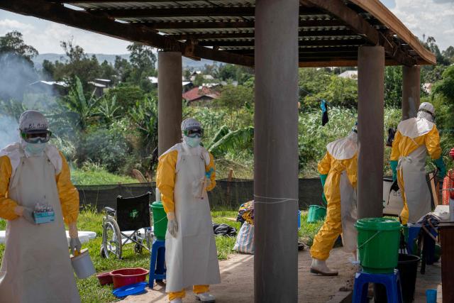 Doctors Without Border (MSF) personnel at the Elikya clinic Ebola treatment center prepare to enter the hospital rooms for Ebola patients in Bunia, in the eastern Democratic Republic of the Congo, on June 5, 2026. (Photo by GLODY MURHABAZI / AFP)