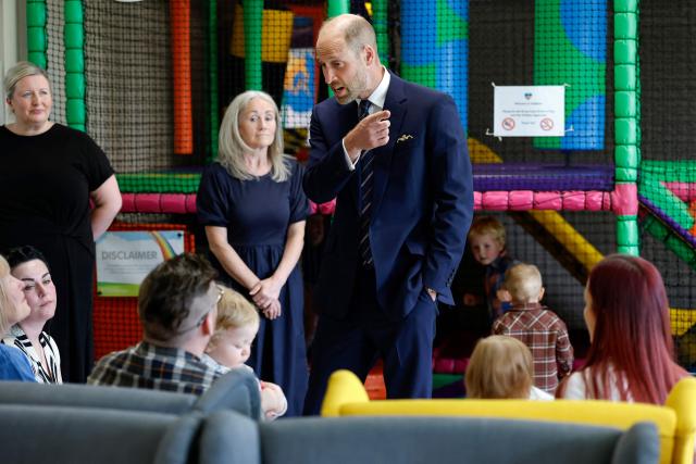 Britain's Prince William, Prince of Wales, meets with serving submariners and their families at Drumfork Centre on the Churchill Estate on June 2, 2026 in Helensburgh, Scotland. Prince Wlliam, Prince of Wales, of Wales, Commodore-in-Chief of the Submarine Service, visited HM Naval Base Clyde (also known as Faslane) to mark the 125th anniversary of the Royal Navy's Submarine Service. (Photo by Jeff J Mitchell / POOL / AFP)
