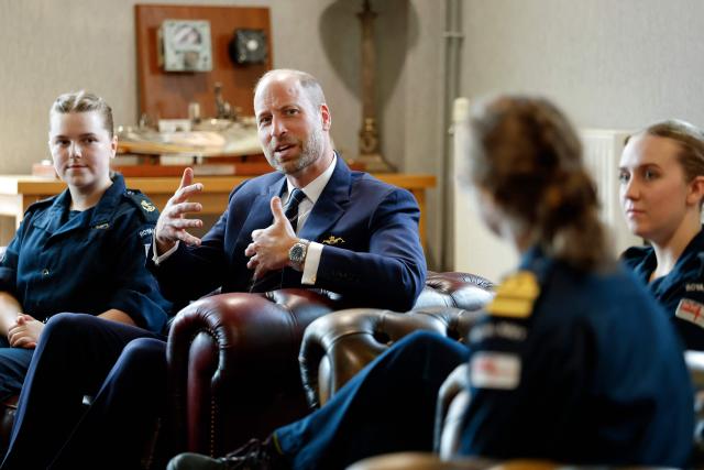 Britain's Prince William, Prince of Wales, meets a group of women of the Submarine Service in the Supermess at HM Naval Base Clyde on June 2, 2026 in Faslane, Scotland. Prince Wlliam, Prince of Wales, of Wales, Commodore-in-Chief of the Submarine Service, visited HM Naval Base Clyde (also known as Faslane) to mark the 125th anniversary of the Royal Navy's Submarine Service. (Photo by Jeff J Mitchell / POOL / AFP)