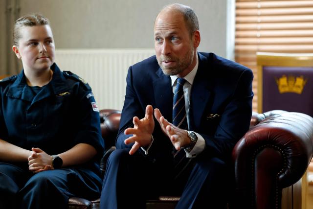 Britain's Prince William, Prince of Wales, meets a group of women of the Submarine Service in the Supermess at HM Naval Base Clyde on June 2, 2026 in Faslane, Scotland. Prince Wlliam, Prince of Wales, of Wales, Commodore-in-Chief of the Submarine Service, visited HM Naval Base Clyde (also known as Faslane) to mark the 125th anniversary of the Royal Navy's Submarine Service. (Photo by Jeff J Mitchell / POOL / AFP)