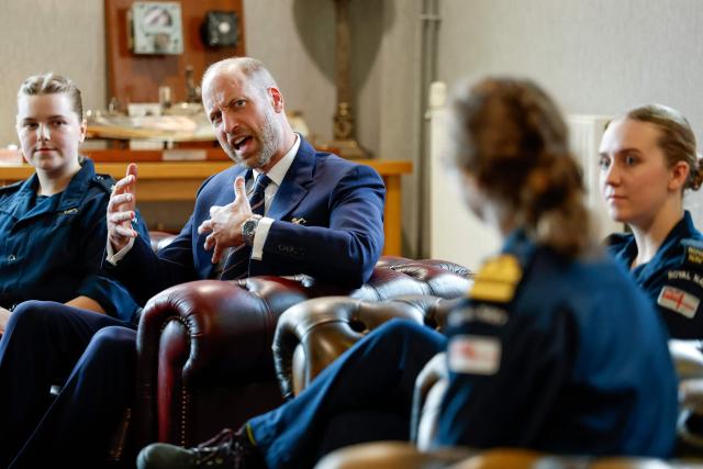 Britain's Prince William, Prince of Wales, meets a group of women of the Submarine Service in the Supermess at HM Naval Base Clyde on June 2, 2026 in Faslane, Scotland. Prince Wlliam, Prince of Wales, of Wales, Commodore-in-Chief of the Submarine Service, visited HM Naval Base Clyde (also known as Faslane) to mark the 125th anniversary of the Royal Navy's Submarine Service. (Photo by Jeff J Mitchell / POOL / AFP)
