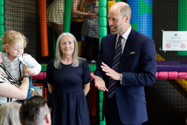 Britain's Prince William, Prince of Wales, meets with serving submariners and their families at Drumfork Centre on the Churchill Estate on June 2, 2026 in Helensburgh, Scotland. Prince Wlliam, Prince of Wales, of Wales, Commodore-in-Chief of the Submarine Service, visited HM Naval Base Clyde (also known as Faslane) to mark the 125th anniversary of the Royal Navy's Submarine Service. (Photo by Jeff J Mitchell / POOL / AFP)