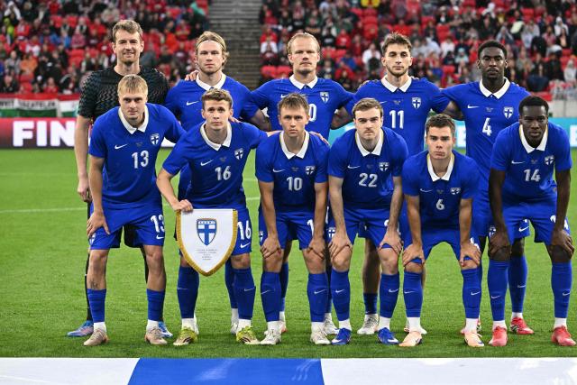 Finland players pose for the team photo prior to the friendly football match between Hungary and Finland at the Puskas Arana in Budapest on June 5, 2026. (Photo by Attila KISBENEDEK / AFP)