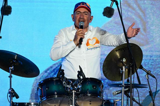 Armenian Prime Minister Nikol Pashinyan plays the drums during a campaign rally of his Civil Contract party in central Yerevan on June 5, 2026, days ahead of the parliamentary elections. (Photo by Karen MINASYAN / AFP)