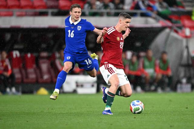 Hungary's forward #20 Roland Sallai (R) and Finland's midfielder #16 Anssi Suhonen (L) vie for the ball during the friendly football match between Hungary and Finland at the Puskas Arena in Budapest on June 5, 2026. (Photo by Attila KISBENEDEK / AFP)