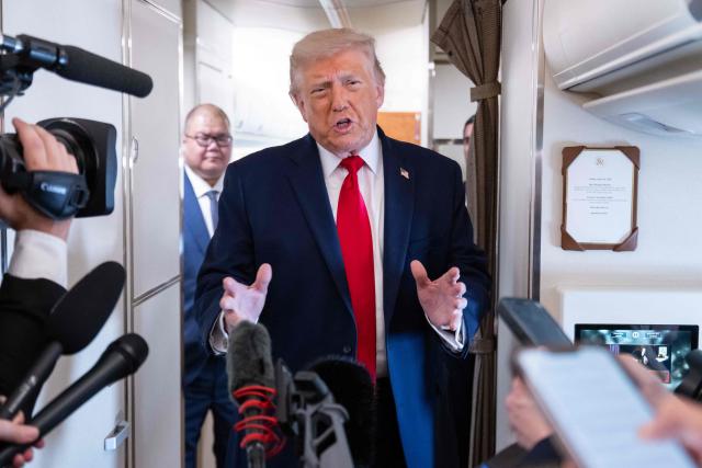 US President Donald Trump speaks with the press aboard Air Force One as he flies from Joint Base Andrews in Maryland to Eau Claire, Wisconsin, June 5, 2026. Trump will participate in a rural economic roundtable on American agriculture in Chippewa Falls. (Photo by SAUL LOEB / AFP)