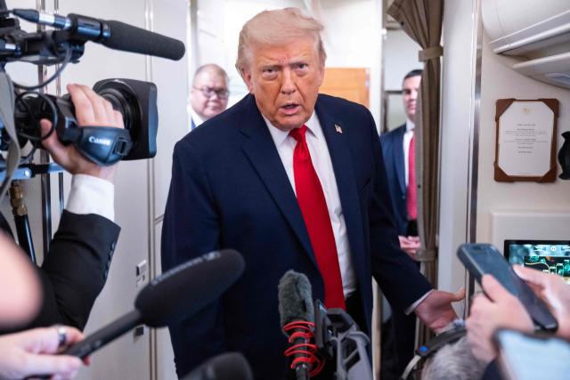 US President Donald Trump speaks with the press aboard Air Force One as he flies from Joint Base Andrews in Maryland to Eau Claire, Wisconsin, June 5, 2026. Trump will participate in a rural economic roundtable on American agriculture in Chippewa Falls. (Photo by SAUL LOEB / AFP)