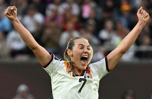 Germany's defender #07 Marie Mueller celebrates scoring the opening goal during the Women's FIFA World Cup qualifying football match between Germany and Norway in Cologne, western Germany on June 5, 2026. (Photo by INA FASSBENDER / AFP) / ALTERNATIVE CROP