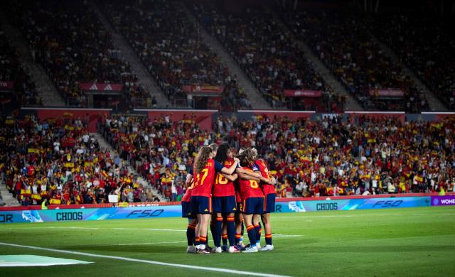 Spain's players celebrate their fourth goal scored by Spain's forward #20 Claudia Pina during the FIFA Women's World Cup Europe Zone Qualifiers, group C, football match between Spain and England at Mallorca Son Moix Stadium in Palma de Mallorca, on June 5, 2026. (Photo by JAIME REINA / AFP)