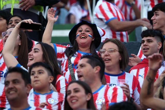 Fans of Paraguay cheer for their team ahead of the international friendly football match between Paraguay and Nicaragua at the Defensores del Chaco Stadium in Asuncion on June 5, 2026. (Photo by DANIEL DUARTE / AFP)