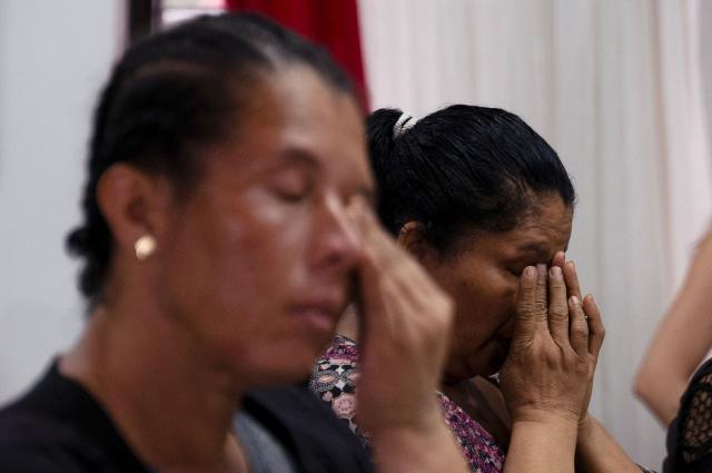Women cry as they attend a memorial mass for Nicaraguan indigenous leader Broklin Rivera, at San Francisco church in San Jose on June 5, 2026. Rivera, a 73-year-old renowned leader of the Miskito people and former member of congress was arrested in September 2023 by the left-wing government of President Daniel Ortega on charges that were never made public. (Photo by Ezequiel BECERRA / AFP)