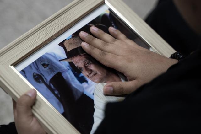 Tininiska Rivera holds a picture of her father, Nicaraguan indigenous leader Broklin Rivera, during a memorial mass at San Francisco church in San Jose on June 5, 2026. Rivera, a 73-year-old renowned leader of the Miskito people and former member of congress was arrested in September 2023 by the left-wing government of President Daniel Ortega on charges that were never made public. (Photo by Ezequiel BECERRA / AFP)