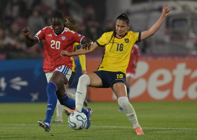 Ecuador's midfielder #16 Ligia Moreira and Chile's midfielder #20 Mary Valencia fight for the ball during the CONMEBOL Nations League Women football match between Chile and Ecuador at the National Stadium in Santiago on June 5, 2026. (Photo by Rodrigo ARANGUA / AFP)