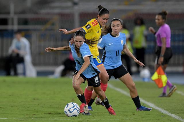Uruguay's midfielder #18 Solange Lemos and Colombia's midfielder #08 Marcela Restrepo fight for the ball during the CONMEBOL Nations League Women football match between Colombia and Uruguay at the Pascual Guerrero stadium in Cali, Valle del Cauca department, Colombia on June 5, 2026. (Photo by JOAQUIN SARMIENTO / AFP)