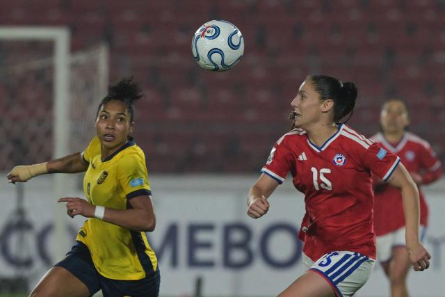 Ecuador's forward #09 Nayely Bolanos and Chile's midfielder #15 Catalina Figueroa fight for the ball during the CONMEBOL Nations League Women football match between Chile and Ecuador at the National Stadium in Santiago on June 5, 2026. (Photo by Rodrigo ARANGUA / AFP)