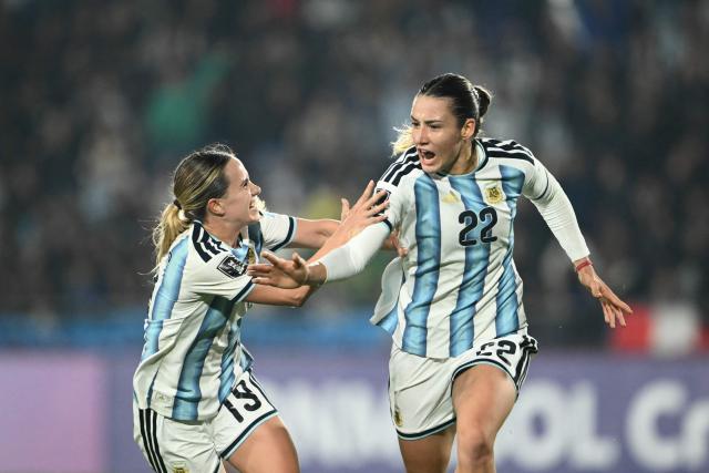 Argentina's forward #22 Mercedez Diz celebrates with her teammate Argentina's forward #19 Agostina Holzheier after scoring a goal during the CONMEBOL Nations League Women football match between Argentina and Peru at the Florencio Sola stadium in Buenos Aires on June 5, 2026. (Photo by Luis ROBAYO / AFP)