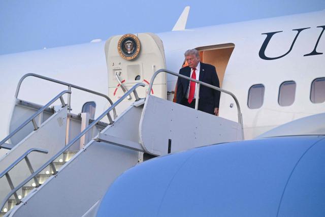 US President Donald Trump disembarks Air Force One upon arrival at Morristown Airport in Morris County, New Jersey, on June 5, 2026. US President Donald Trump will spend the weekend in Bedminster, New Jersey. (Photo by SAUL LOEB / AFP)