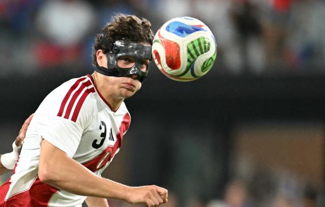 Peru's defender #03 Fabio Gruber prepares to head the ball during the international friendly football match between Haiti and Peru at Nu Stadium in Miami, Florida on June 5, 2026. (Photo by CHANDAN KHANNA / AFP)