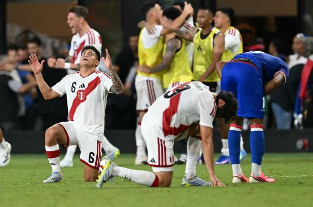 Peru's midfielder #06 Jesus Pretell and teammates celebrates after winning the international friendly football match between Haiti and Peru at Nu Stadium in Miami, Florida on June 5, 2026. (Photo by CHANDAN KHANNA / AFP)