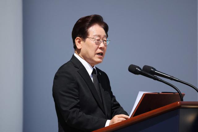 South Korea's President Lee Jae Myung delivers a speech during a ceremony marking the 71st Memorial Day to commemorate veterans and independent activists at the National Cemetery in Seoul on June 6, 2026. (Photo by KIM HONG-JI / POOL / AFP)