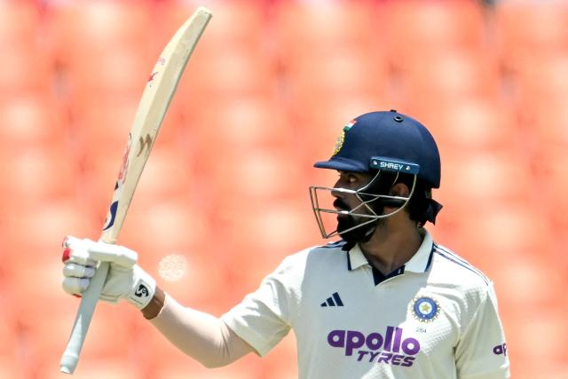 India's KL Rahul celebrates after scoring a half-century (50 runs) during the first day of the only Test cricket match between India and Afghanistan at the Maharaja Yadavindra Singh International Cricket Stadium on the outskirts of Chandigarh on June 6, 2026. (Photo by Shammi MEHRA / AFP)