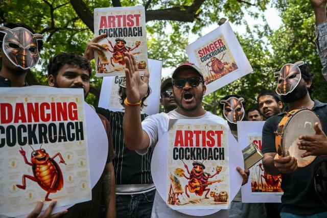 Cockroach Janta Party (CJP) supporters shout slogans during a protest over alleged irregularities in the country's major examinations, in New Delhi on June 6, 2026. Hundreds of young students gathered in New Delhi on June 6 for the first street protest by the satirical "Cockroach People's Party" over alleged irregularities in major examinations held in the country recently. (Photo by Arun SANKAR / AFP)