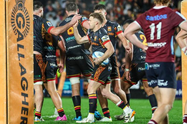 Chiefs celebrate a try during the Super Rugby Qualifying Final match between the Chiefs and Queensland Reds at FMG Stadium in Hamilton on June 6, 2026. (Photo by DJ MILLS / AFP)
