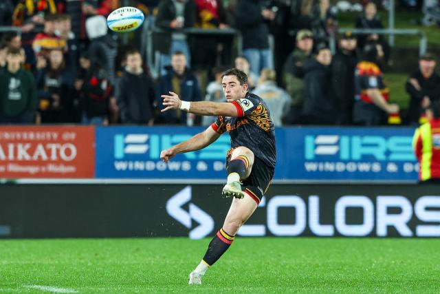 Chiefs' Josh Jacomb kicks the ball during the Super Rugby Qualifying Final match between the Chiefs and Queensland Reds at FMG Stadium in Hamilton on June 6, 2026. (Photo by DJ MILLS / AFP)