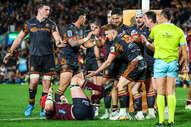 Chiefs celebrate a try during the Super Rugby Qualifying Final match between the Chiefs and Queensland Reds at FMG Stadium in Hamilton on June 6, 2026. (Photo by DJ MILLS / AFP)