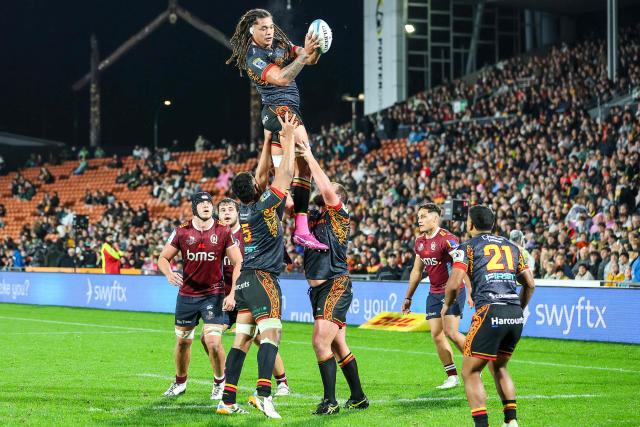 Chiefs' Seuseu Naitoa Ah Kuoi catches the ball during the Super Rugby Qualifying Final match between the Chiefs and Queensland Reds at FMG Stadium in Hamilton on June 6, 2026. (Photo by DJ MILLS / AFP)
