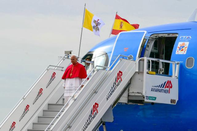 Pope Leo XIV arrives at the Adolfo Suarez Madrid/Barajas International Airport, Saturday, June 6, 2026, on the occasion of his Apostolic journey to Spain. Pope Leo XIV is visiting Spain June 6-12 with stops in Madrid, Barcelona, and the Canary Islands, where he will meet with migrants and organisations dedicated to helping them. (Photo by Stefano RELLANDINI / AFP)