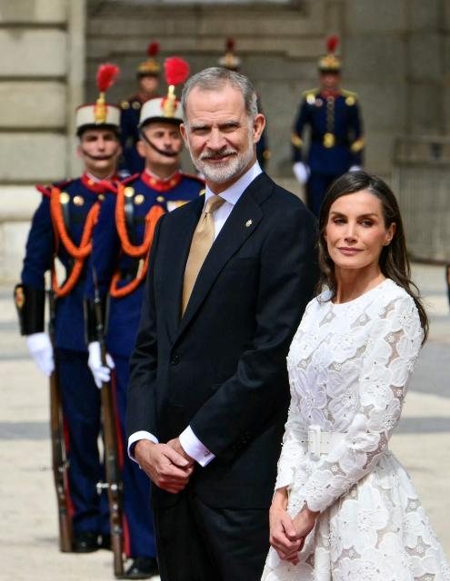 Spain's Felipe VI and Queen Letizia welcome Pope Leo XIV (not seen) at the Royal Palace in Madrid on June 6, 2026. Pope Leo XIV is visiting Spain June 6-12 with stops in Madrid, Barcelona, and the Canary Islands, where he will meet with migrants and organisations dedicated to helping them. (Photo by Stefano RELLANDINI / AFP)