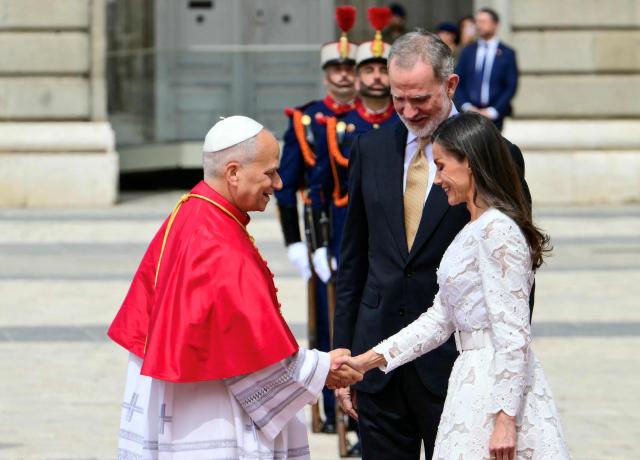 Spain's Felipe VI and Queen Letizia welcome Pope Leo XIV at the Royal Palace in Madrid on June 6, 2026. Pope Leo XIV is visiting Spain June 6-12 with stops in Madrid, Barcelona, and the Canary Islands, where he will meet with migrants and organisations dedicated to helping them. (Photo by Stefano RELLANDINI / AFP)
