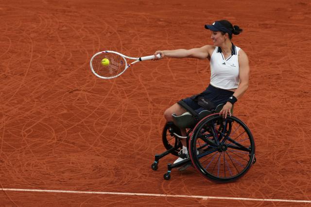 France's Ksenia Chasteau plays a forehand return to Netherlands' Diede de Groot during their women's singles wheelchair final match on day 14 of the French Open tennis tournament on Court Suzanne-Lenglen at the Roland-Garros Complex in Paris on June 6, 2026. (Photo by Dimitar DILKOFF / AFP)