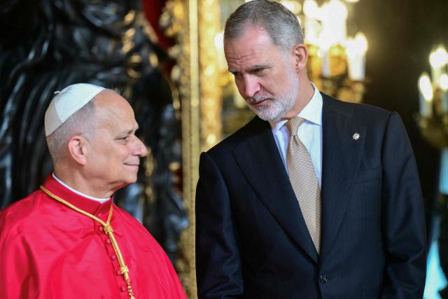 Spain's Felipe VI talks with Pope Leo XIV during a welcome ceremony at the Royal Palace in Madrid on June 6, 2026. Pope Leo XIV is visiting Spain June 6-12 with stops in Madrid, Barcelona, and the Canary Islands, where he will meet with migrants and organisations dedicated to helping them. (Photo by Stefano RELLANDINI / AFP)