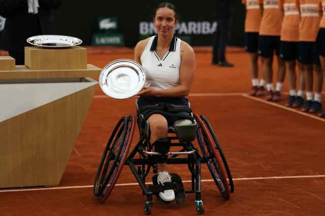 France's Ksenia Chasteau poses with her trophy after being defeating by Netherlands' Diede de Groot in their women's singles wheelchair final match on day 14 of the French Open tennis tournament on Court Suzanne-Lenglen at the Roland-Garros Complex in Paris on June 6, 2026. (Photo by Dimitar DILKOFF / AFP)