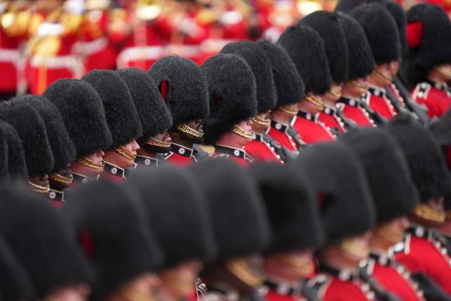 Grenadier Guards, members of the Household Division take part in the Colonel's Review on Horse Guards Parade in London on June 6, 2026. The Colonel's Review is the final evaluation of the King's birthday parade before it is seen during the Trooping of the Colour on June 13. (Photo by CARLOS JASSO / AFP)