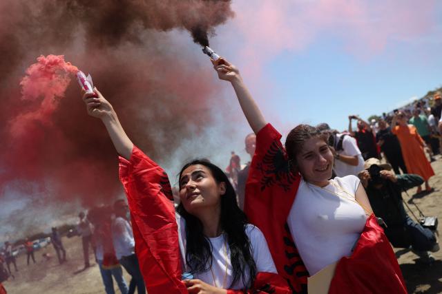 People take part in  a demonstration against the construction of a luxury resort near a protected natural area in Zvernec near Vlore on June 6, 2026. Several thousand citizens demonstrated in Tirana for the second consecutive night on June 4, 2026 to demand transparency around a tourist complex project allegedly linked to US President Donald Trump's son-in-law, Jared Kushner. The demonstrators argue that the estimated $1.2 billion project, led by Kushner and his wife Ivanka, will harm the environment, with plans for luxury hotels in the protected area of Vjosa-Narta on the southern coast. (Photo by Adnan Beci / AFP)