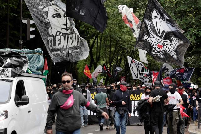Demonstrators take part in a march to mark the 13th anniversary of the death in 2013 of anti-fascist militant Clement Meric, who died after a brawl with skinheads, in Paris on June 6, 2026. (Photo by STEPHANE DE SAKUTIN / AFP)