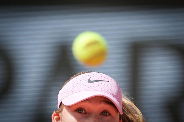 Russia's Mirra Andreeva eyes the ball as she preapres to return to Poland's Maja Chwalinska during their women's final singles match on day 14 of the French Open tennis tournament on Court Philippe-Chatrier at the Roland-Garros Complex in Paris on June 6, 2026. (Photo by Thomas SAMSON / AFP)