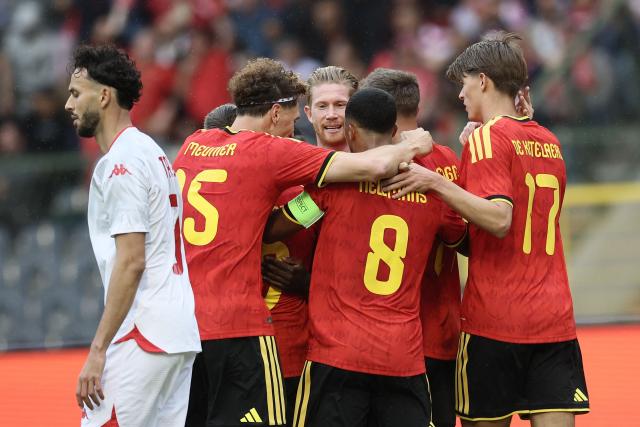 Belgian players celebrate scoring the opening goal during the international friendly football match between Belgium and Tunisia at the King Baudouin Stadium in Brussels on June 6, 2026. (Photo by BRUNO FAHY / BELGA / AFP) / Belgium OUT