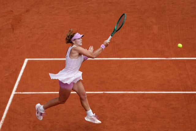 Russia's Mirra Andreeva plays a forehand return to Poland's Maja Chwalinska during their women's final singles match on day 14 of the French Open tennis tournament on Court Philippe-Chatrier at the Roland-Garros Complex in Paris on June 6, 2026. (Photo by Dimitar DILKOFF / AFP)